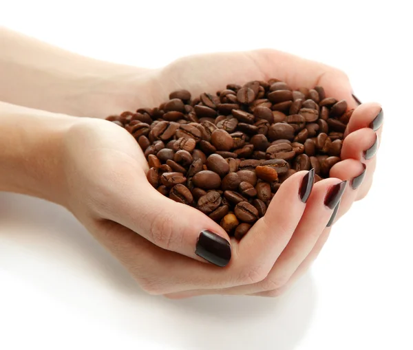 Mains féminines avec grains de café, isolées sur blanc — Photo