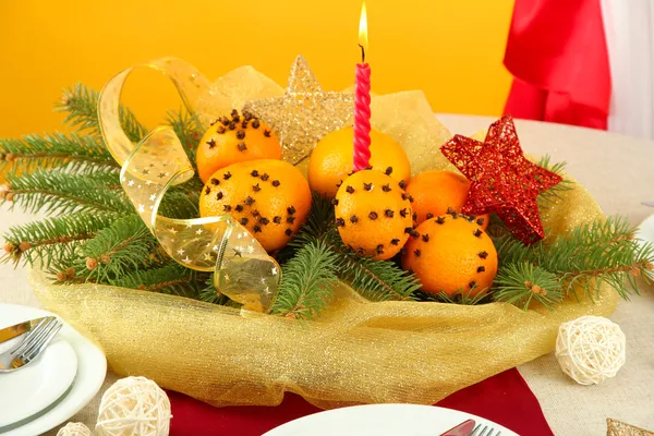 Beautiful christmas table setting with tangerines and fir tree, close up — Stock Photo, Image