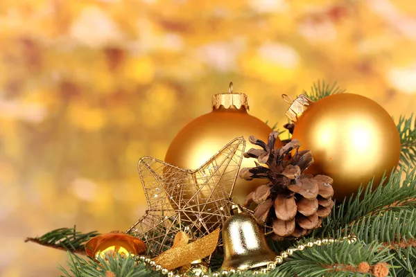 Christmas decoration on yellow background — Stock Photo, Image