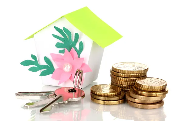 Small house with money and key isolated on white — Stock Photo, Image