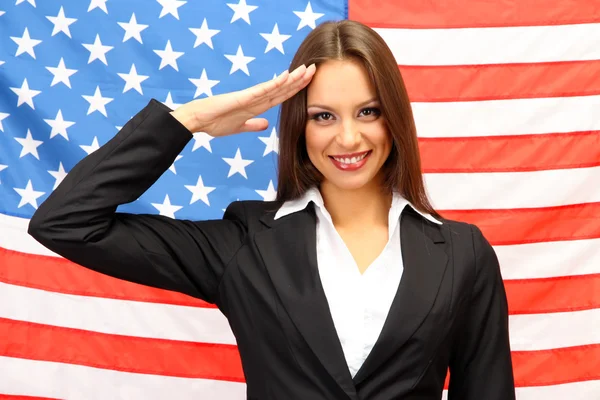 Młoda kobieta z amerykańską flagą — Zdjęcie stockowe