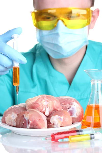 Scientist injecting GMO into the meat — Stock Photo, Image