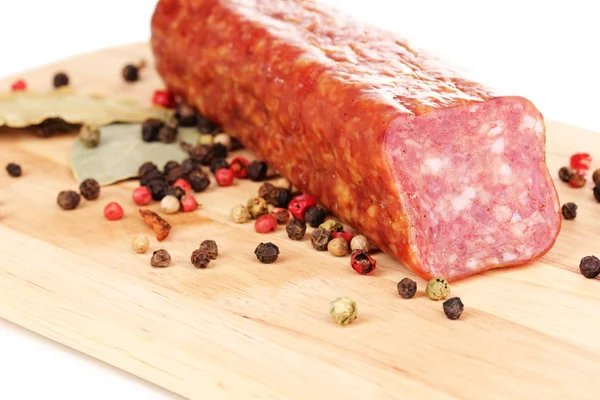 Tasty sausage on chopping board close-up — Stock Photo, Image