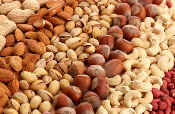 Sortiment av välsmakande nötter, närbild — Stockfoto
