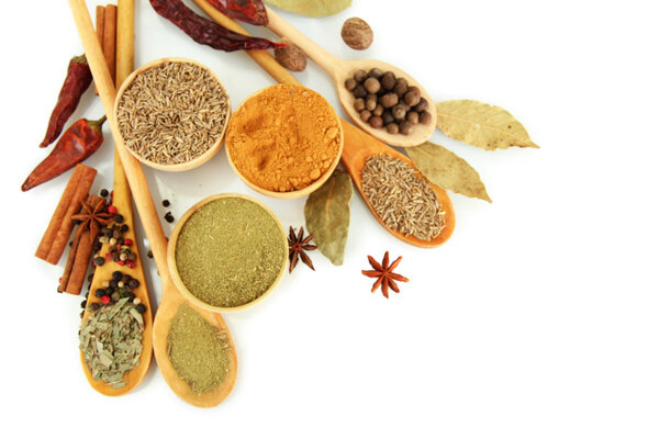 wooden bowls and spoons with spices, isolated on white