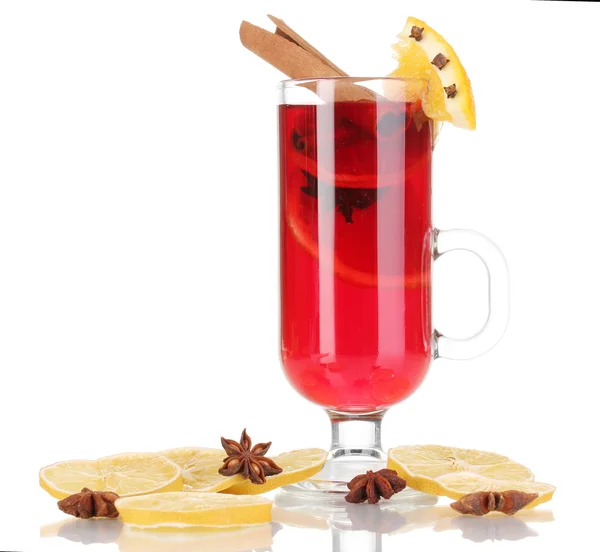 Fragrant mulled wine in glass with spices and oranges around isolated on white — Stock Photo, Image