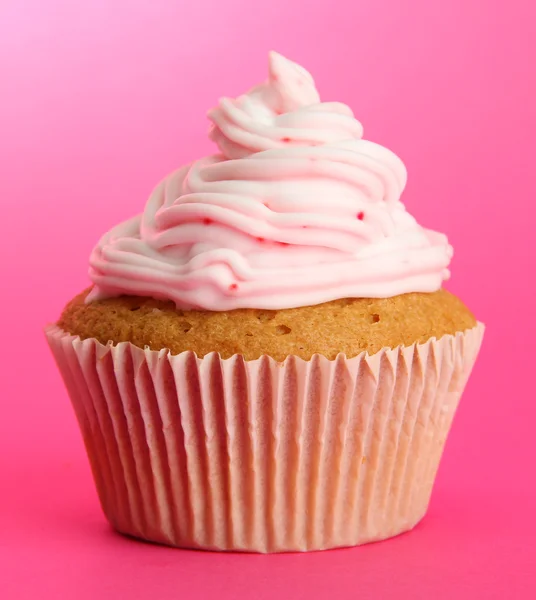 Cupcake savoureux, sur fond rose — Photo