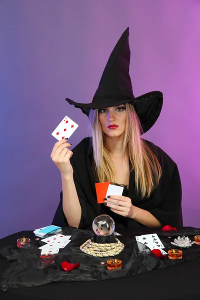 Witch - fortuneteller on color background — Stock Photo, Image