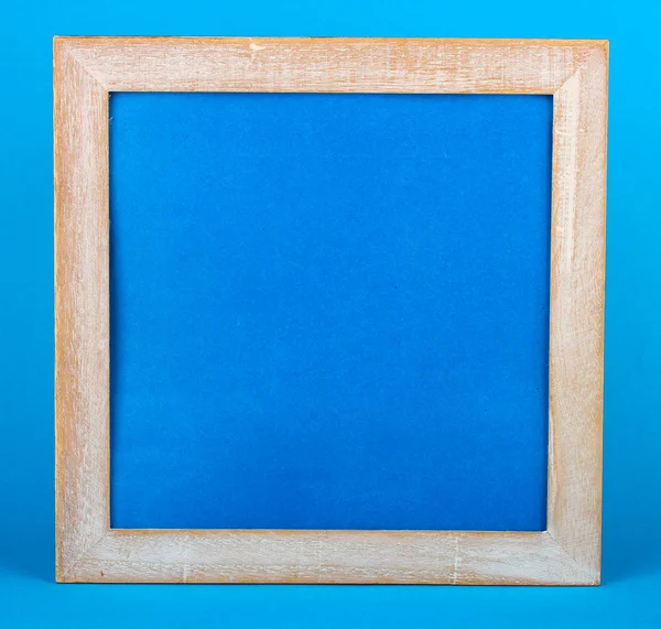 Houten frame op kleur achtergrond — Stockfoto