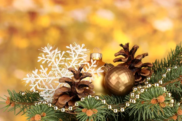 Christmas decoration on yellow background — Stock Photo, Image