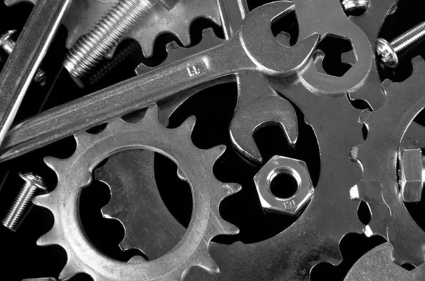 Maskin redskap, metall kugghjul, bultar och muttrar bakgrund, närbild — Stockfoto