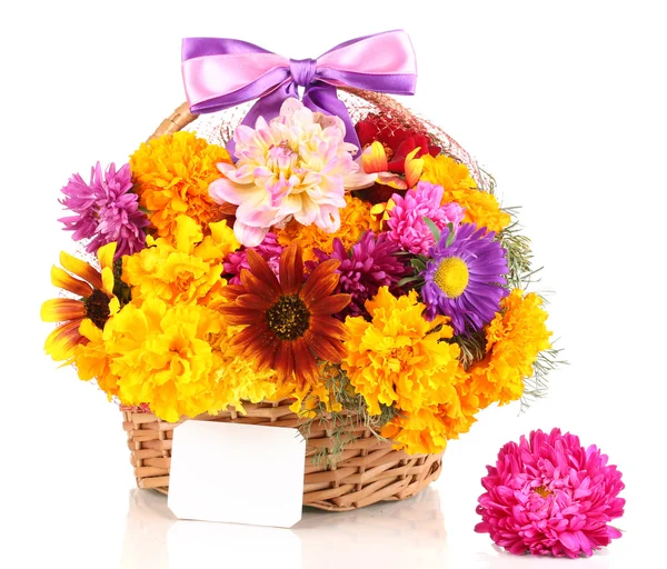 Beautiful bouquet of bright flowers in basket with paper note isolated on white — Stock Photo, Image