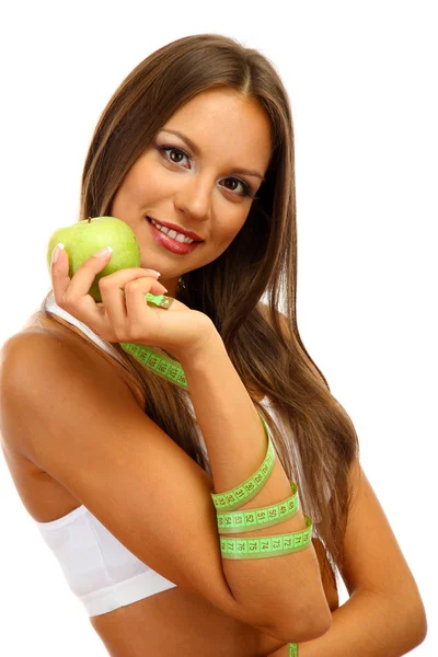 Bela jovem com maçã verde e fita métrica, isolado em branco — Fotografia de Stock