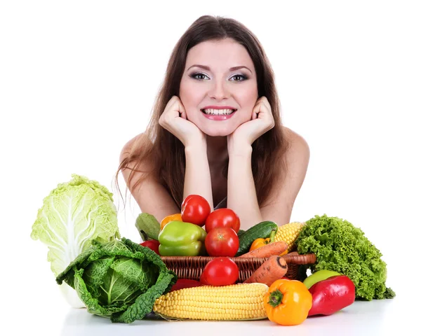 Hermosa mujer con verduras en la mesa aislada en blanco —  Fotos de Stock