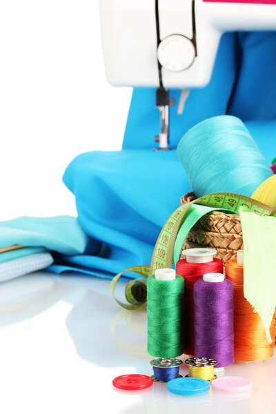 sewing machine and fabric isolated on white