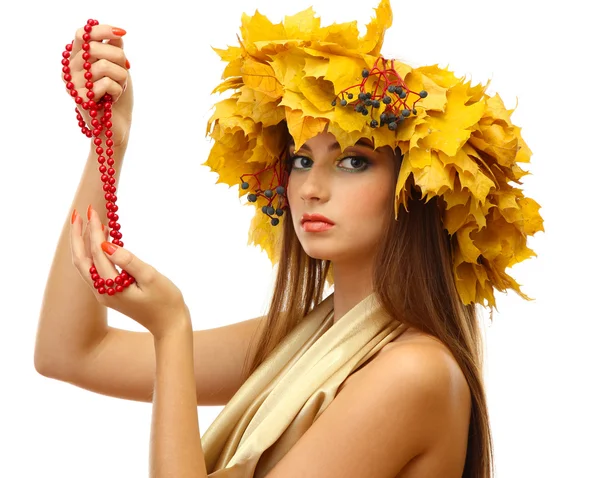 Beautiful young woman with yellow autumn wreath and beads, isolated on white — Stock Photo, Image