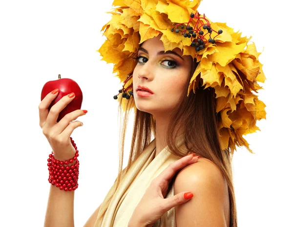 Beautiful young woman with yellow autumn wreath and apple, isolated on white — Stock Photo, Image