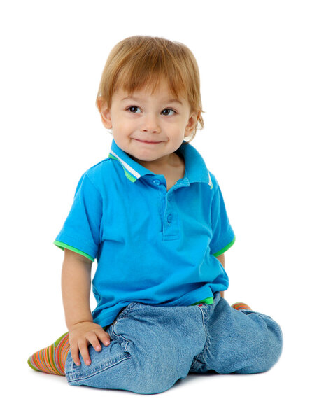 Little boy playing with multicolor blocks