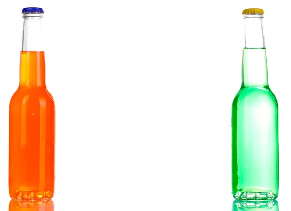 Tasty drinks in bottles isolated on white — Stock Photo, Image