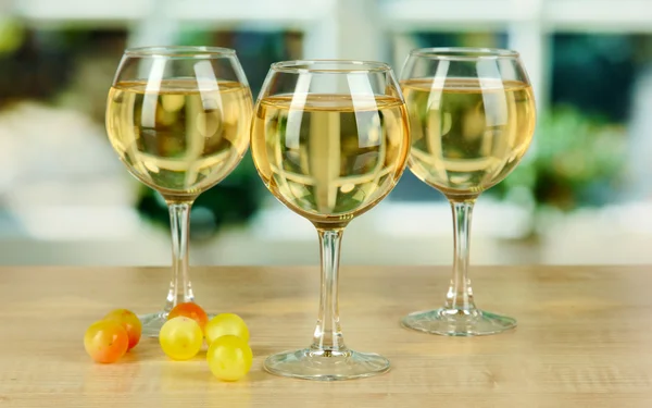 White wine in glass on window background — Stock Photo, Image