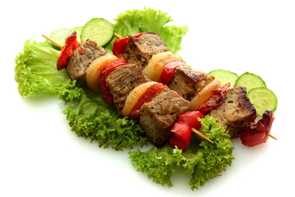 Tasty grilled meat and vegetables on skewers, isolated on white — Stock Photo, Image