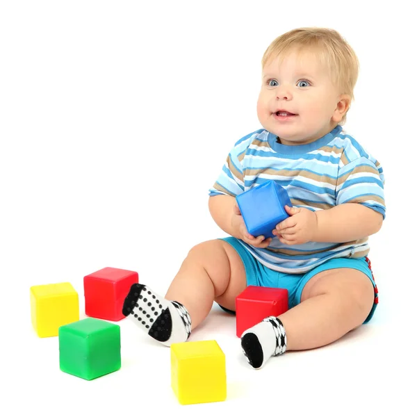 Little boy playing with multicolor blocks Stock Photo