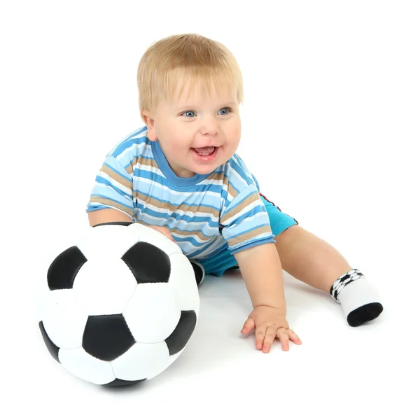 Niño jugando con pelota de fútbol, aislado en blanco Imágenes de stock libres de derechos