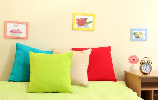 Empty bed with pillows and sheets in bedroom — Stock Photo, Image