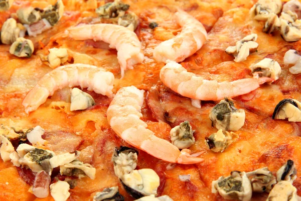 Ízletes pizza a közeli tenger gyümölcsei — Stock Fotó