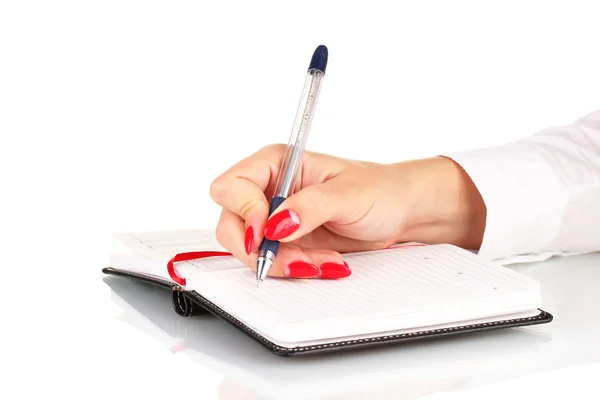 Hand signing in notebook isolated on white — Stock Photo, Image