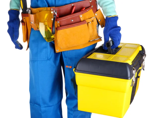 Male builder in blue overalls with yellow suitcase isolated on white — Stock Photo, Image