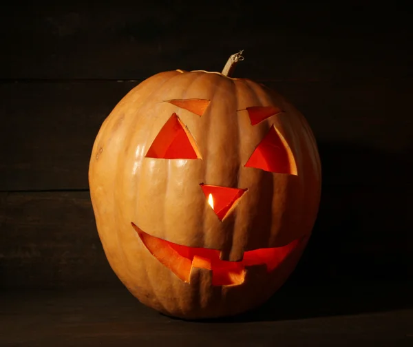 Calabaza de halloween, sobre fondo de madera — Foto de Stock