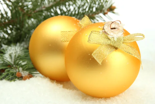 Christmas balls on fir tree with snow, isolated on white — Stock Photo, Image