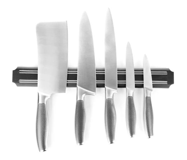 Set of knives on magnetic holder isolated on white — Stock Photo, Image