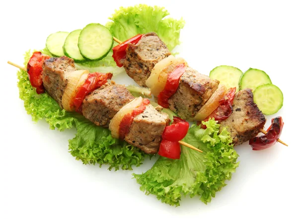 Tasty grilled meat and vegetables on skewers, isolated on white — Stock Photo, Image