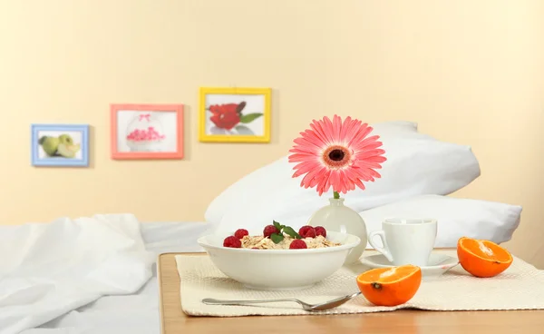 Light breakfast on the nightstand next to the bed — Stock Photo, Image