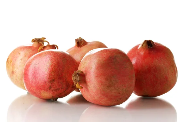 Ripe pomegranates isolated on white — Stock Photo, Image