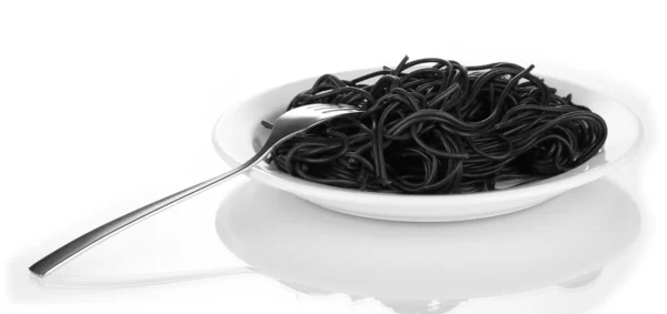 Black spaghetti isolated on white — Stock Photo, Image