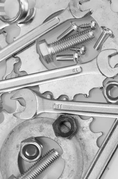 Equipo de la máquina, ruedas dentadas de metal, tuercas y pernos de fondo, primer plano — Foto de Stock