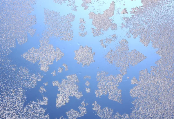 Schneeflockenmuster am Fenster — Stockfoto