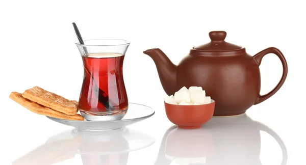 Glass of Turkish tea and kettle isolated on white — Stock Photo, Image