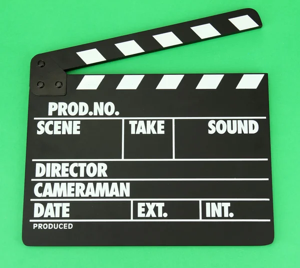 Film production clapper conseil sur fond de couleur — Photo