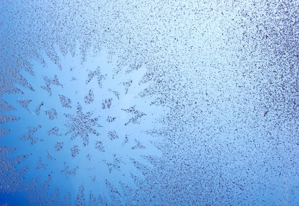 Padrão de floco de neve na janela — Fotografia de Stock