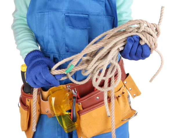 Male builder in blue overalls with rope isolated on white — Stock Photo, Image