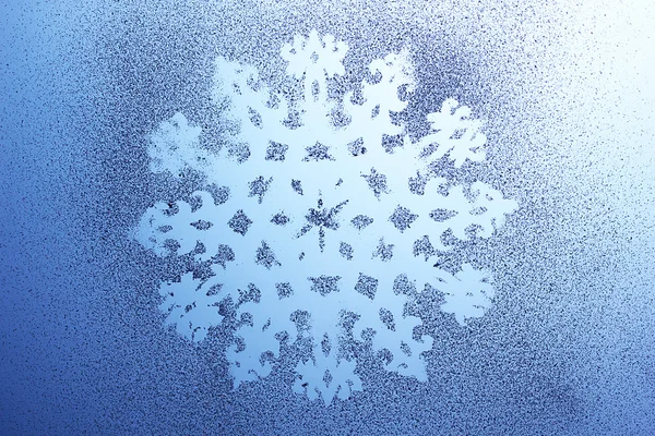 Snowflake pattern on window — Stock Photo, Image