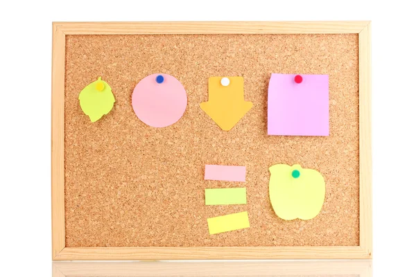 Colorful sticky notes on board isolated on white — Stock Photo, Image