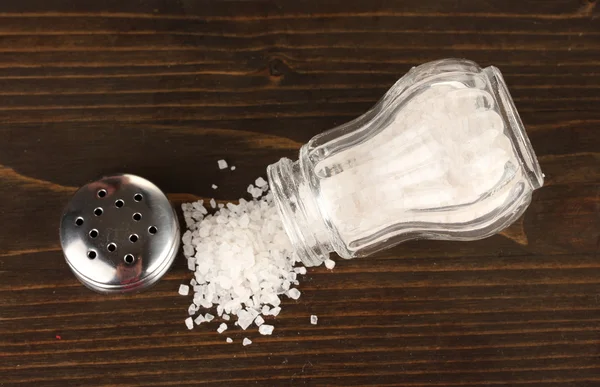 Salt sprinkled on table — Stock Photo, Image