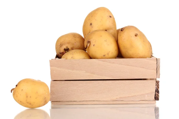 Ripe potatoes on wooden box isolated on white — Stock Photo, Image