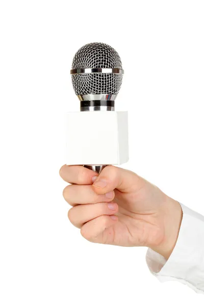 Ręka z mikrofonem na białym tle — Zdjęcie stockowe