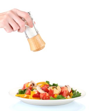 el ekleyerek tuz tuz shaker üzerinde beyaz izole kullanarak